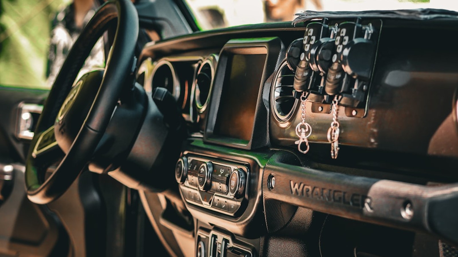Rugged Jeep cockpit and dashboard, the kind of space where a trail radio gets mounted