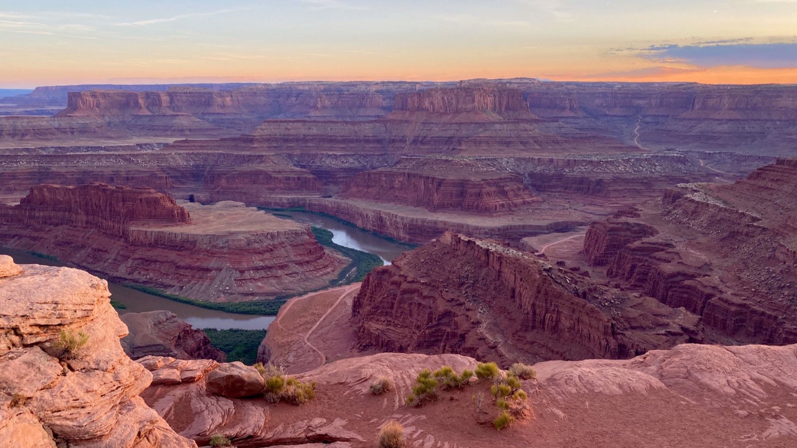 Sweeping red rock canyon country near Moab catching warm first light