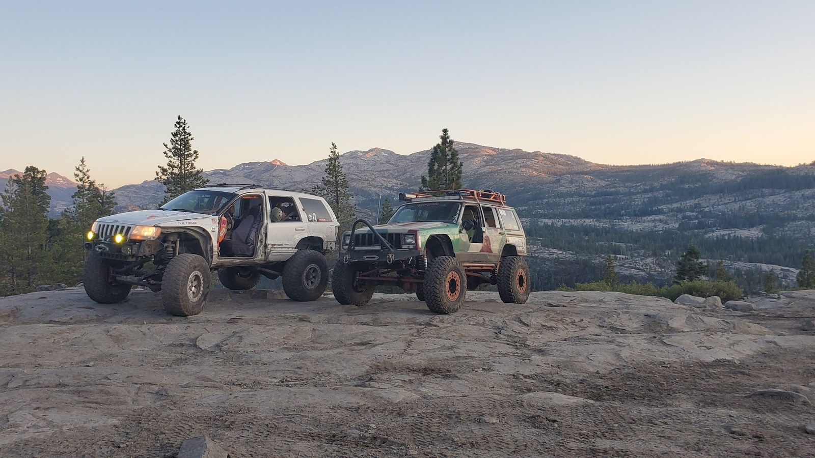 A 4x4 picking a line across the granite slabs of the Rubicon Trail in the Sierra Nevada